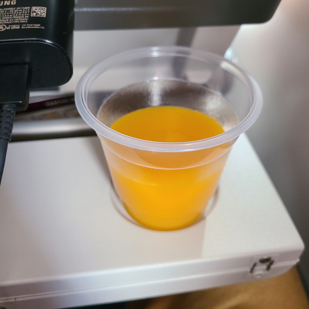 Qatar Airways Airbus A350-1000 Economy Class Orange Juice