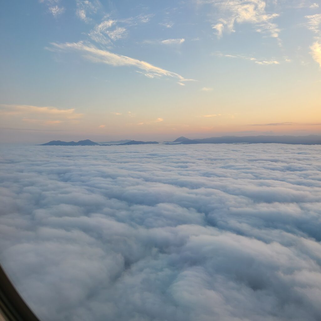 Hokkaido above clouds with sunset