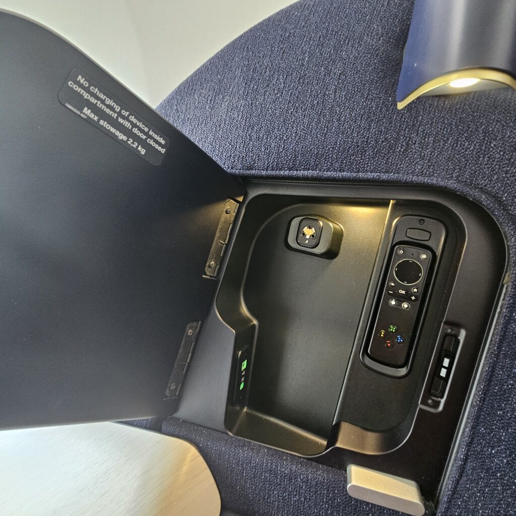 Review: Finnair Airbus A350-900 Business Class (DFW-HEL) 9 Finnair Airbus A350-900 Business Class Headset Compartment